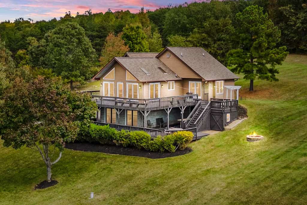 Updated lakefront home & studio with water views, hot tub, dock & game room