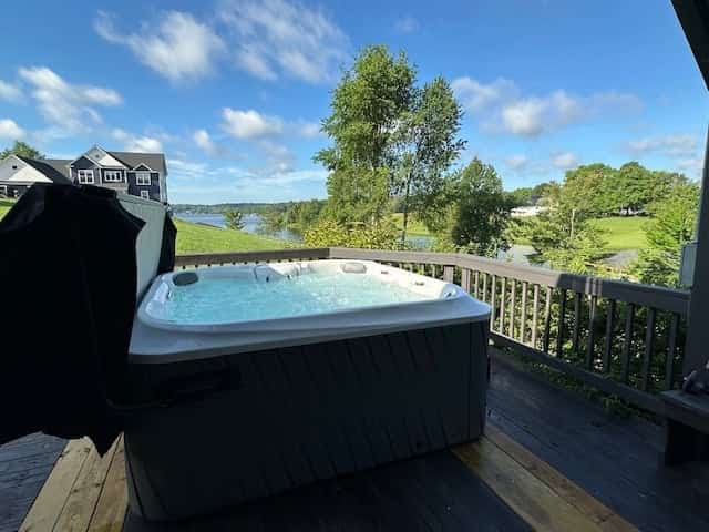Updated lakefront home & studio with water views, hot tub, dock & game room