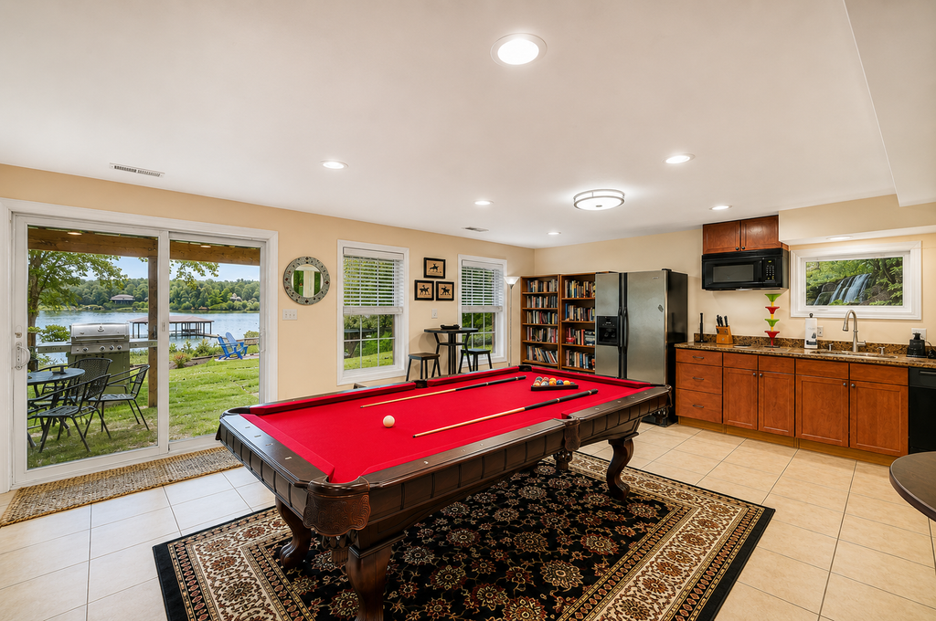 Lakeside retreat with a firepit, dock, deck, hot tub, pool table - dog friendly