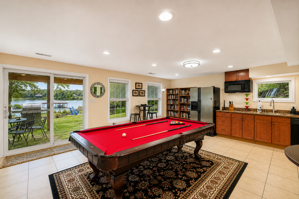 Lakeside retreat with a firepit, dock, deck, hot tub, pool table - dog friendly