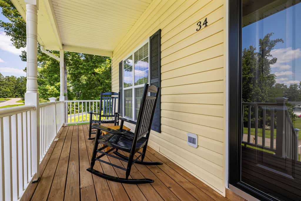Lakeview escape near beach with fenced dog run, porch & dock with one boat slip