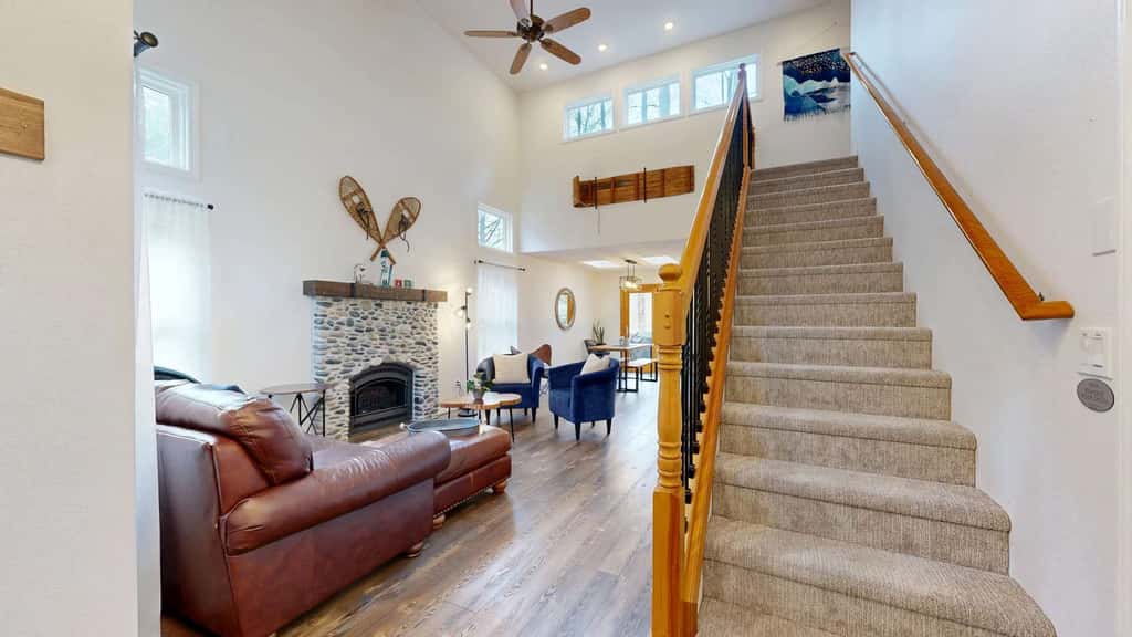 Riverfront retreat with panoramic river and forest views