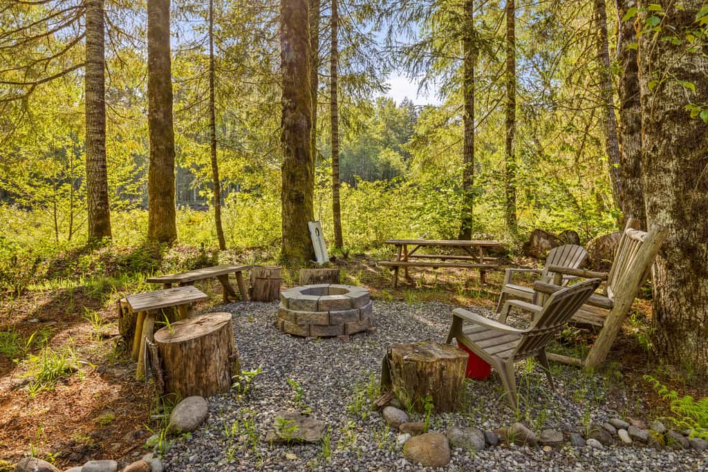 Riverfront retreat with panoramic river and forest views