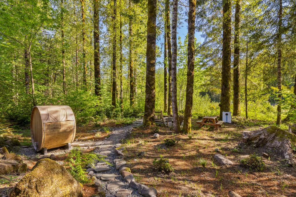 Riverfront retreat with panoramic river and forest views