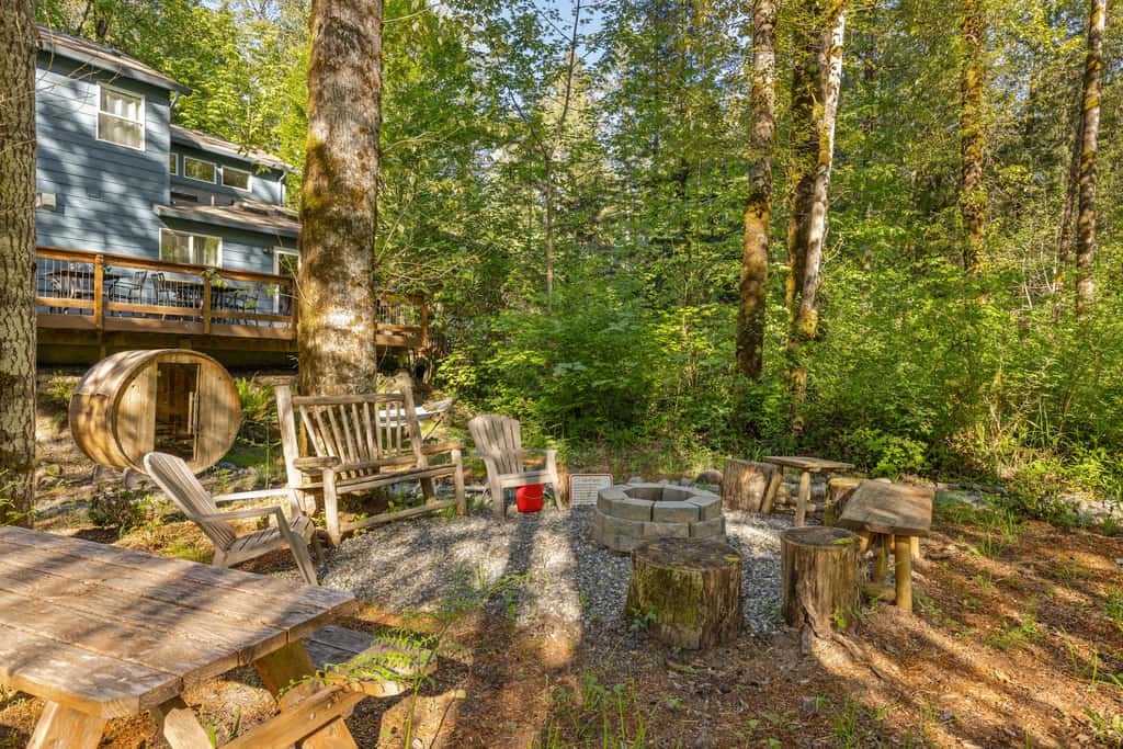 Riverfront retreat with panoramic river and forest views