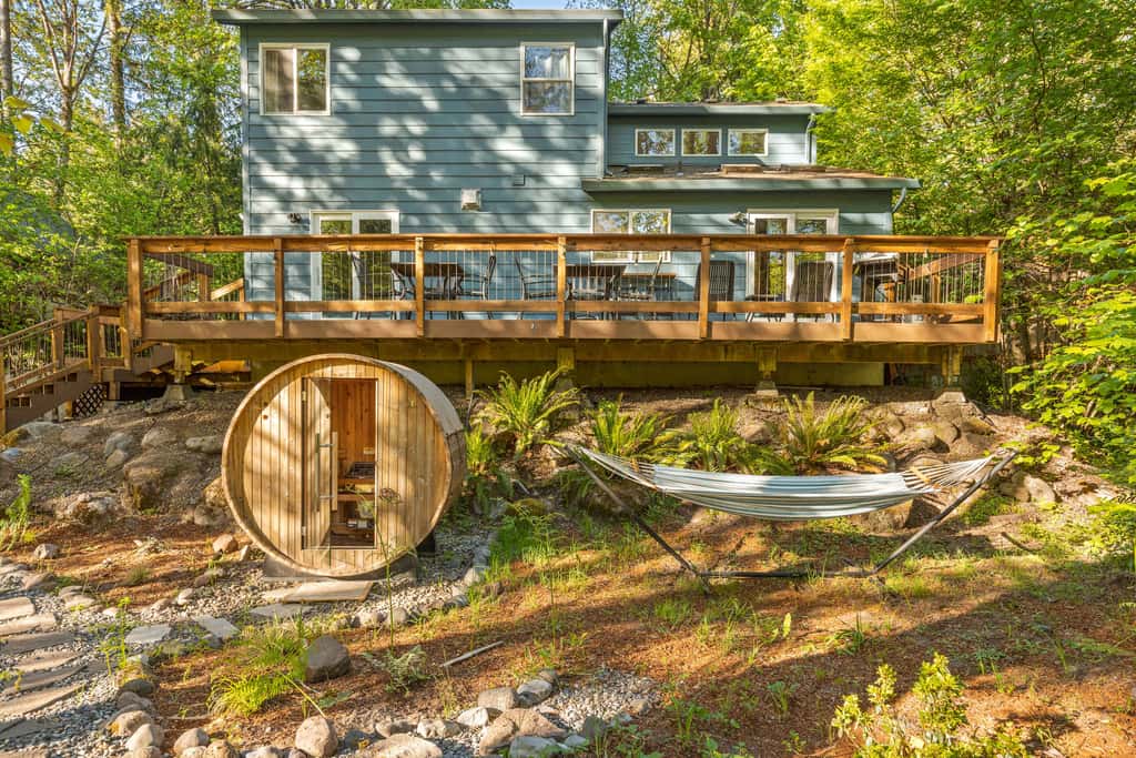 Riverfront retreat with panoramic river and forest views