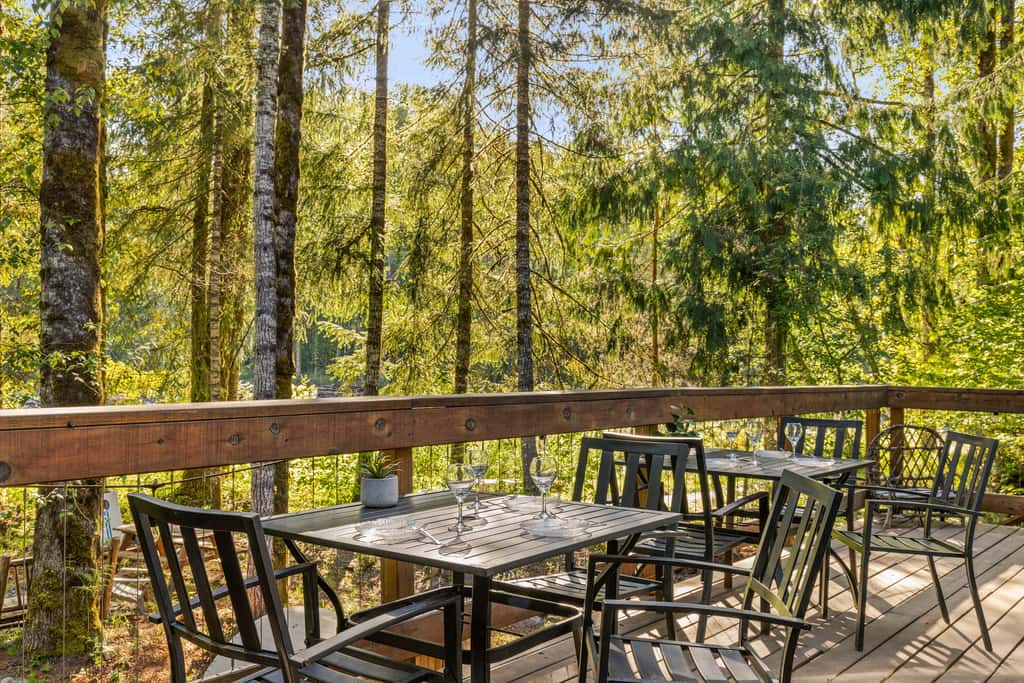 Riverfront retreat with panoramic river and forest views