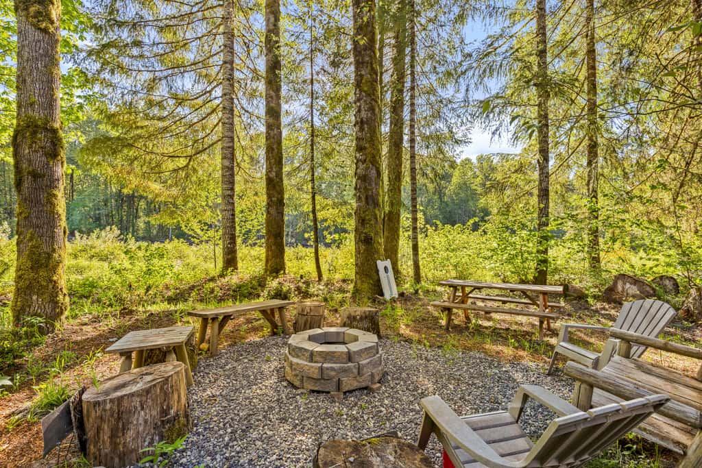 Riverfront retreat with panoramic river and forest views