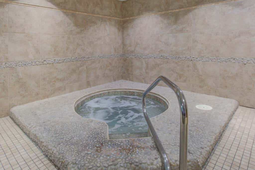 Gorgeous gulf front condo with pools, hot tub, and gym
