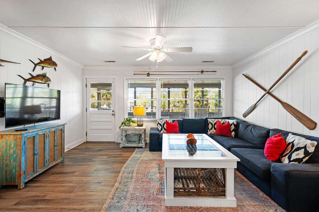 Welcome to "Weeks End" located at 3511 Palmetto Blvd, Edisto Beach! 
4BR, 2BA | Sleeps 12

Welcome to “Weeks End,” your perfect Edisto Island getaway. This inviting coastal home blends relaxed beach style with plenty of space for family and friends to unwind.

The front screened porch sets the tone for laid-back living, complete with a porch swing, rocking chairs, and a picnic table—ideal for morning coffee or evening breezes. Inside, you’ll find an open living, dining, and kitchen area designed for comfort and connection. The living room features ample seating and a large TV, while the dining table accommodates 8–10 guests, with additional seating for three at the kitchen bar. The well-equipped kitchen makes meal prep easy, and a back door leads to a sunny deck overlooking the fenced yard and bike path.

The home offers four bedrooms and two full bathrooms. On one side of the house, you’ll find a queen bedroom and a bunk room with a twin over double bunk and an additional twin over twin bunk—perfect for kids or groups. A full bathroom with tub/shower is conveniently located in the hall. On the opposite side, there’s another queen bedroom and a second bunk room with another twin over double bed bunk and a twin over twin bunk bed, along with another full bathroom with a walk-in shower. 

Downstairs, enjoy extra space for relaxing and entertaining, including a shaded seating area, dining space, and a laundry room with washer and dryer. There’s also an outdoor shower (hot and cold), a charcoal grill, and a fish cleaning station—everything you need for a classic beach vacation.

Additional features include high speed wifi internet service, plenty of parking for multiple vehicles or a boat, and a fully fenced backyard.

Sheets and Bath Towels are provided!

Book your stay at Weeks End and experience all the charm and comfort of Edisto living. 