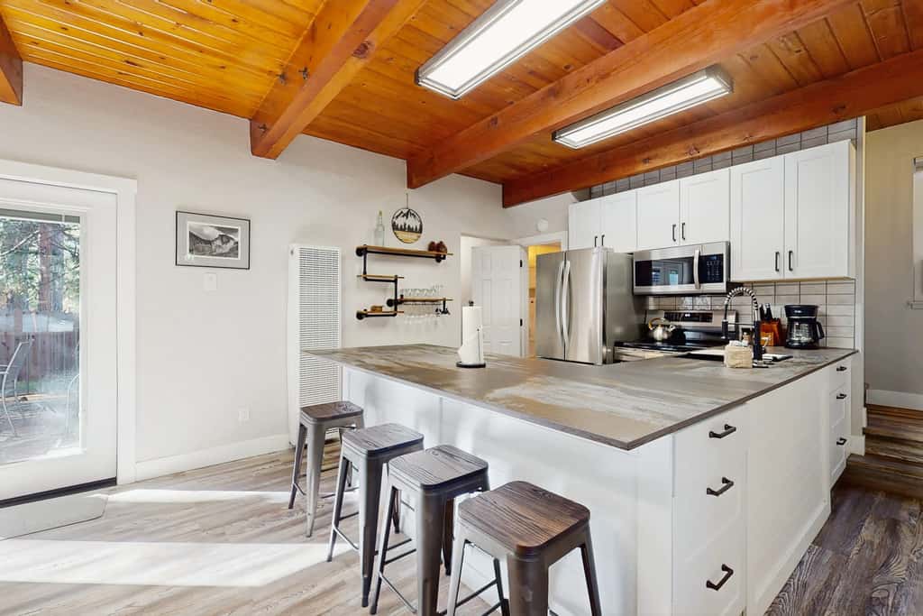 Rustic-modern Kings Beach cabin with fire pit, BBQ decks, and a private yard—perfect for year-round Tahoe getaways!