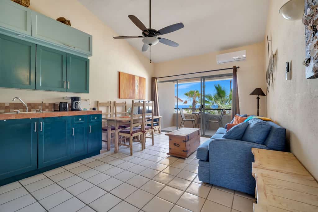Viva 28, from the front door of the condo, a fully equipped kitchen, a brightly colored sofa (full-size bed) with a television connected with ROKU technology and a table, designed for four, stands firm against one wall. A full bathroom makes its appearance just before entering the bedroom with a queen-size bed a closet and ornate furniture that takes up little space. On a balcony, a patio set for two. A crystal-clear pool and a new Pickle ball court are the sensation of Viva.
