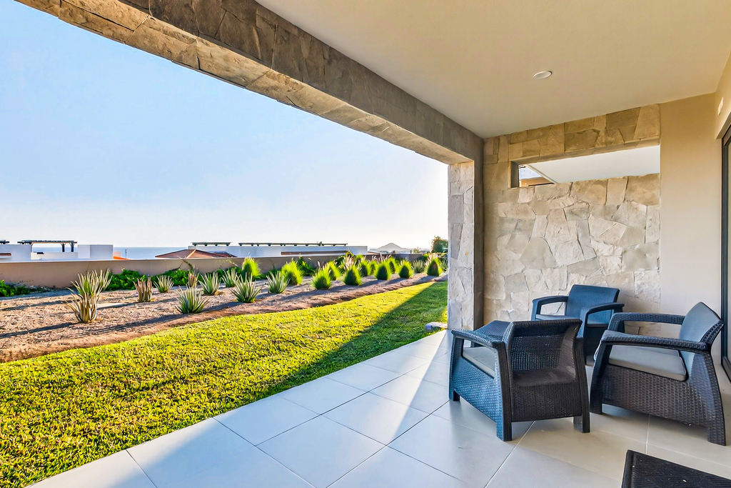 Modern apartment with. ocean view, pool, patio, tennis, & gym