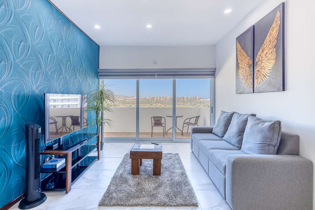 Experience the perfect blend of luxury, comfort, and breathtaking ocean views in our two-bedroom apartment at Marea Los Cabos.
• One king-size bed, one double bed, and one sofa bed
• Private balcony with views and an in-unit washer and dryer
• Fully equipped kitchen, central AC, fast Wi-Fi
• Short drive to Cabo’s oceanfront, vibrant downtown, and top attractions
• Access to an on-site gym and fitness room
• Single-level layout offering easy, step-free access throughout
• Available laundry center