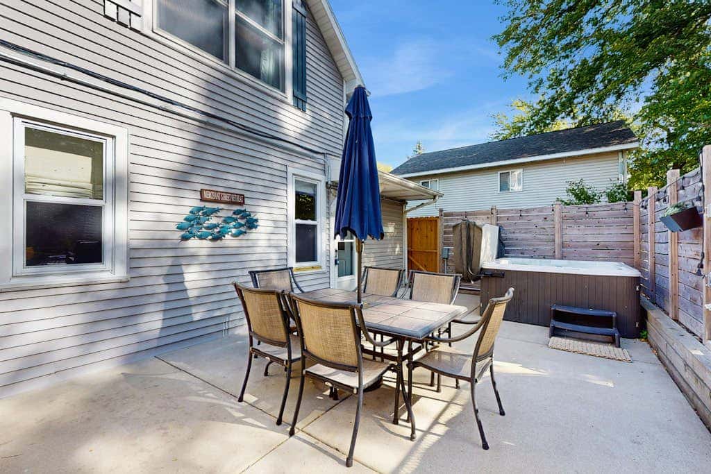 Merchant Street Pool Retreat with a  Year-Round Hot Tub.