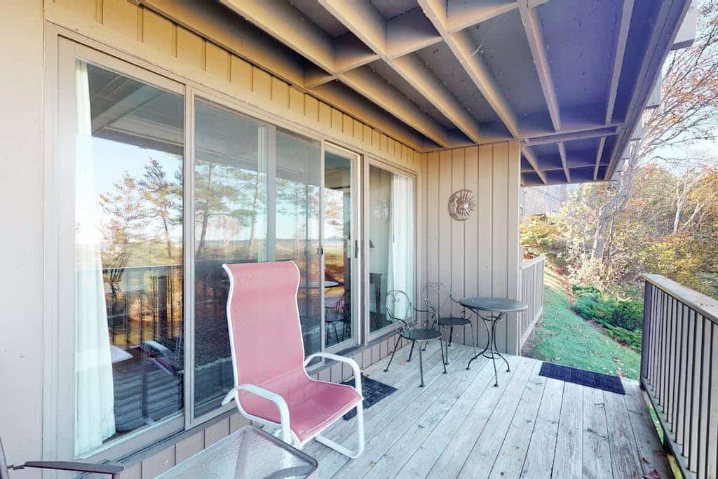 Riverfront condo with beach access to lake, fireplace, furnished deck & cable