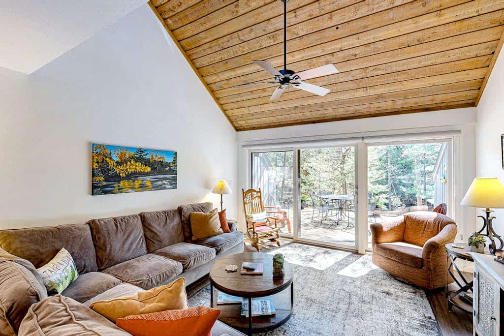 Riverfront condo with lake access, views, deck, washer/dryer, community firepit