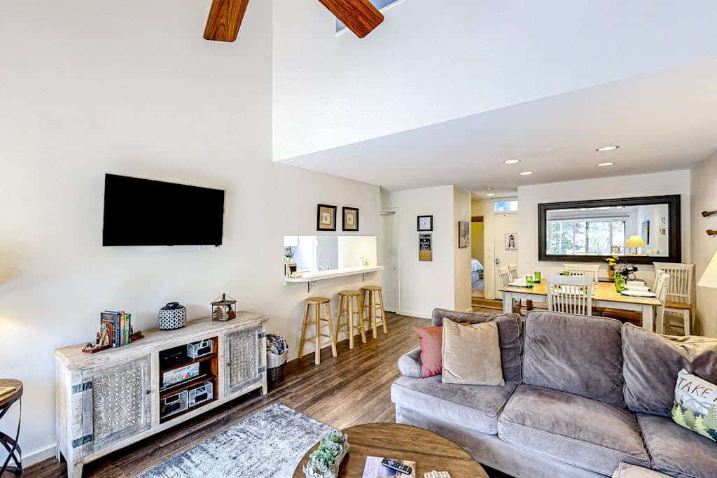 Riverfront condo with lake access, views, deck, washer/dryer, community firepit