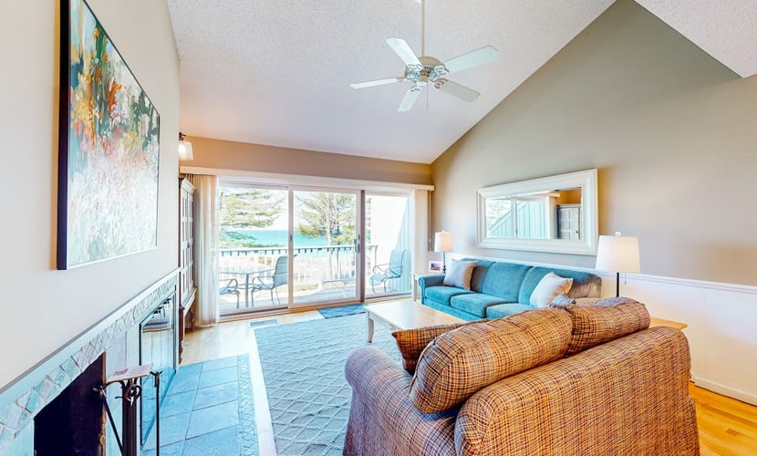 Waterfront condo near skiing with beach access, on-site golf & fireplace