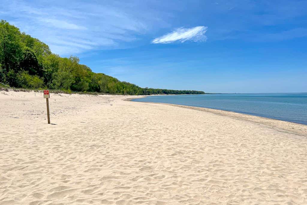 Fully-renovated lakefront home with beach cabana, association beach, & firepit