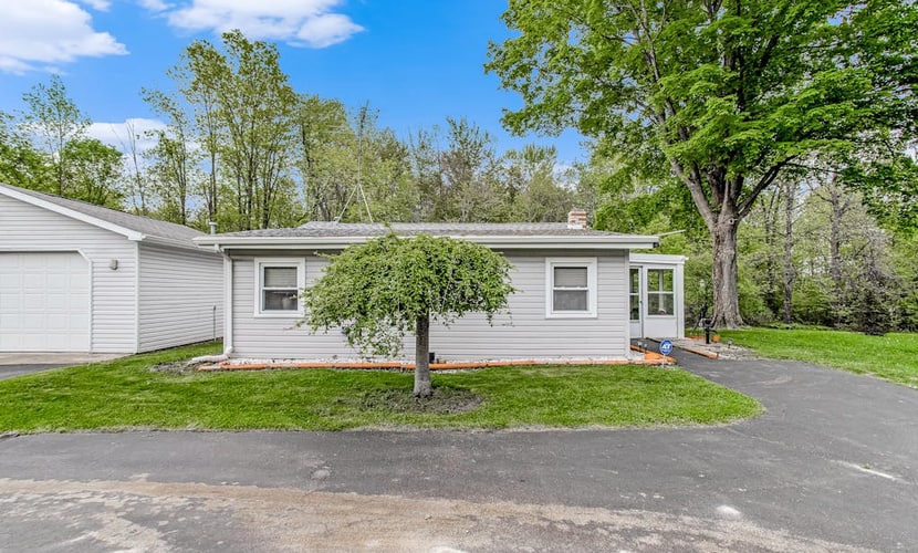 Charming home with sunroom, large yard, full kitchen, & washer/dryer