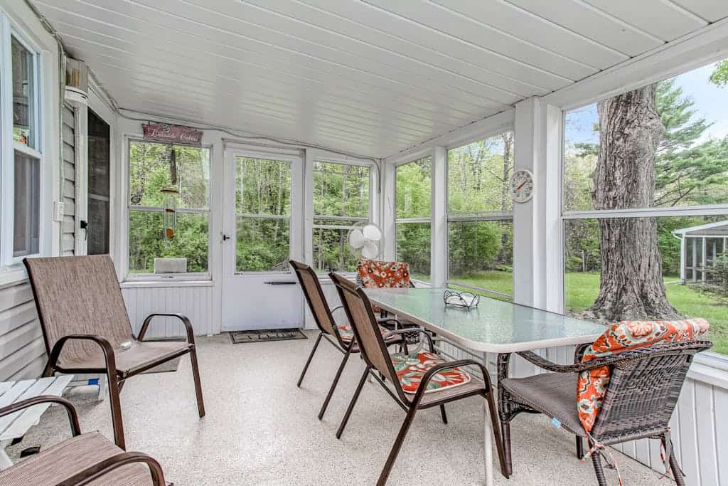 Charming home with sunroom, large yard, full kitchen, & washer/dryer