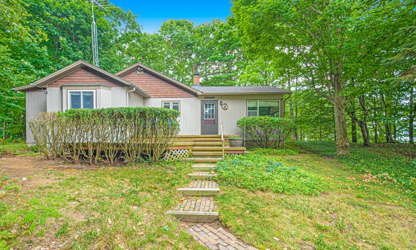 Inviting dog-friendly home with Lake Michigan views & charming sunroom