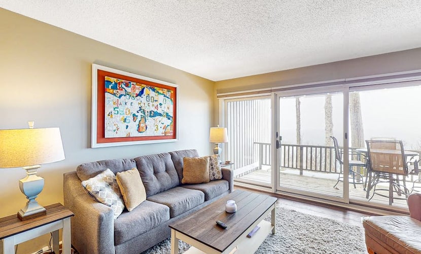 Bayfront condo with lake & bay views, deck, 2 fireplaces, private washer/dryer