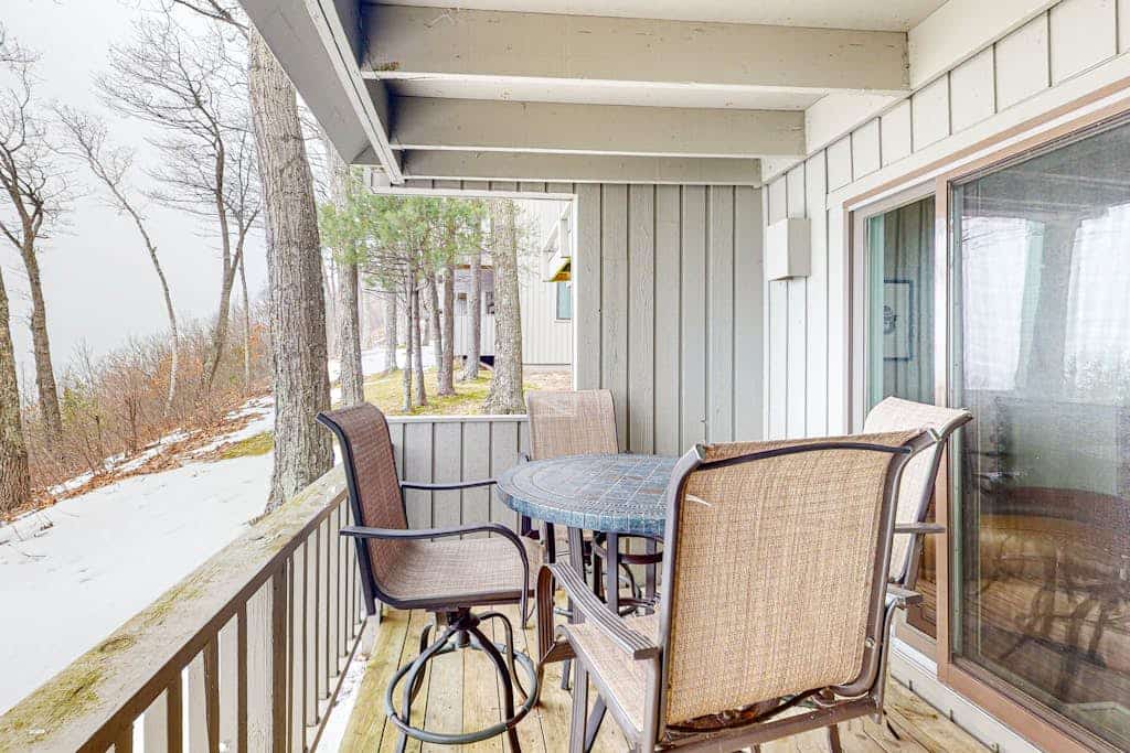 Bayfront condo with lake & bay views, deck, 2 fireplaces, private washer/dryer
