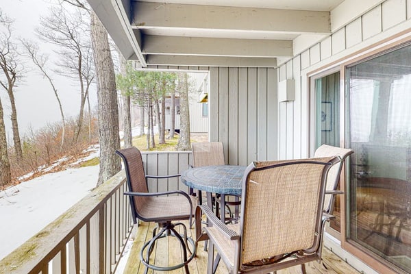 Bayfront condo with lake & bay views, deck, 2 fireplaces, private washer/dryer