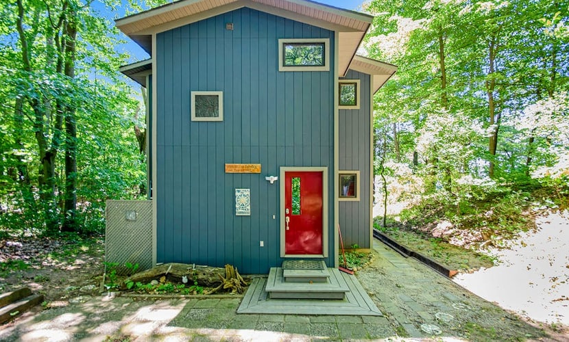 Dog-friendly home with lake views, wood stove, kayaks/SUPs, & W/D