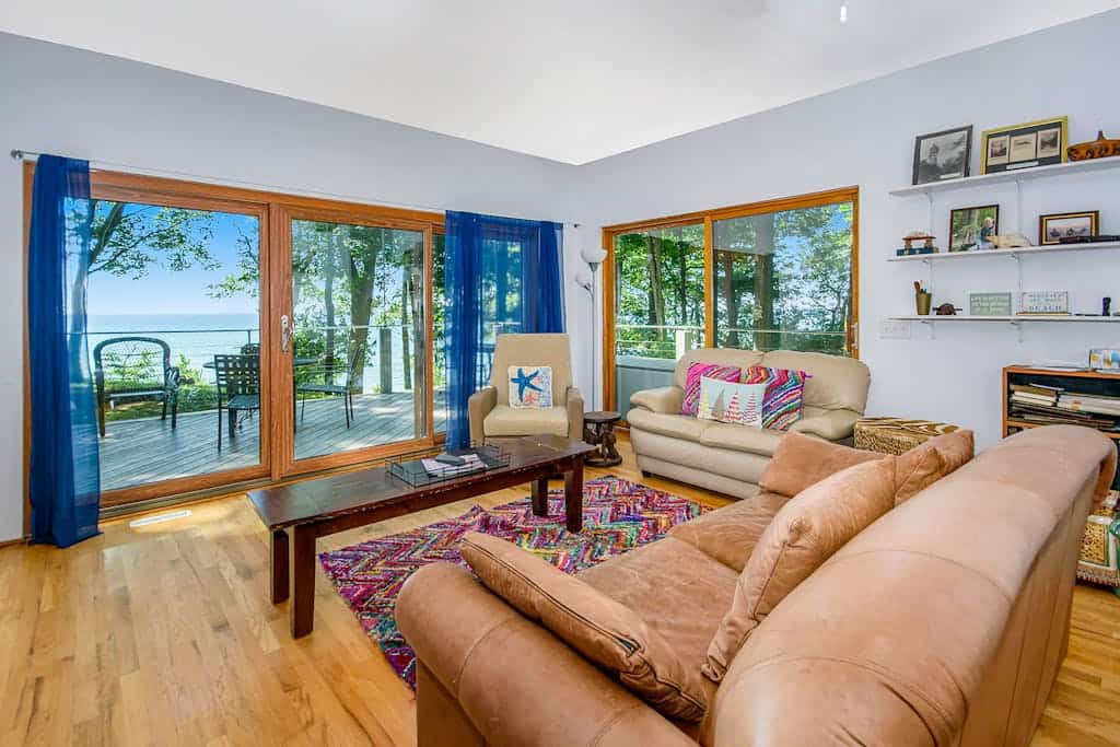 Dog-friendly home with lake views, wood stove, kayaks/SUPs, & W/D