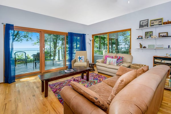 Dog-friendly home with lake views, wood stove, kayaks/SUPs, & W/D