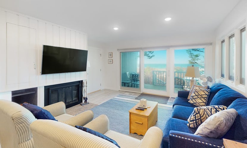 Beachfront condo in Glen Arbor with deck, fireplace, Lake Michigan views & W/D
