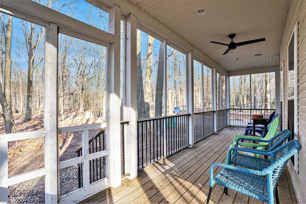 Modern Lake Michigan home with wood fireplace, open layout, deck, W/D, & AC