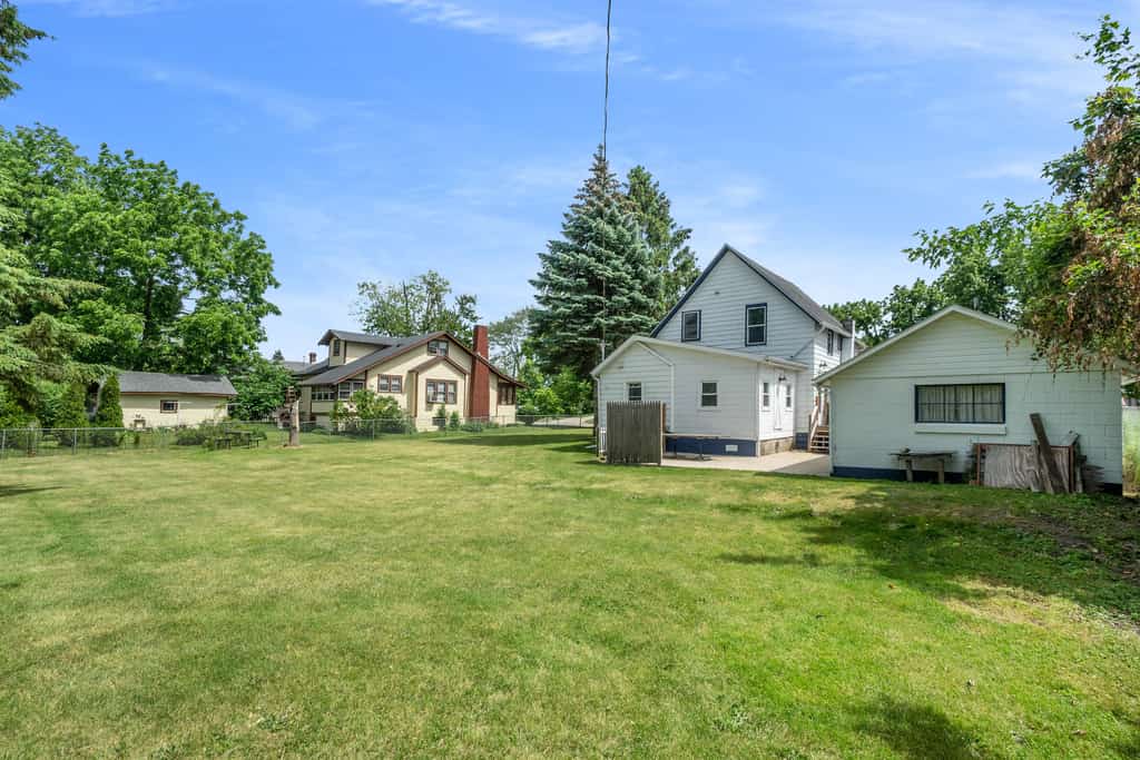 Updated, charming home with huge yard, fire pit, & WiFi - walkable location