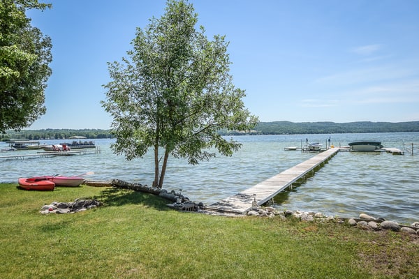 Dog-friendly and lakefront home with firepit close to restaurants and shops