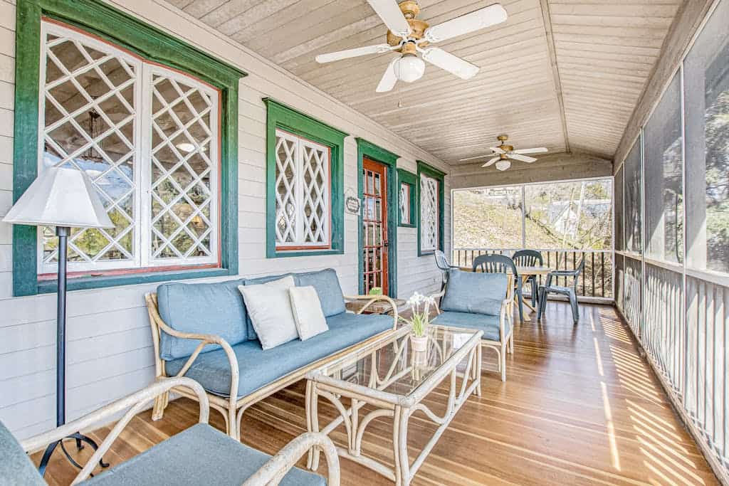 Calming Cottage on the River W/ Furnished Porch, Lofted Layout & Ideal Location