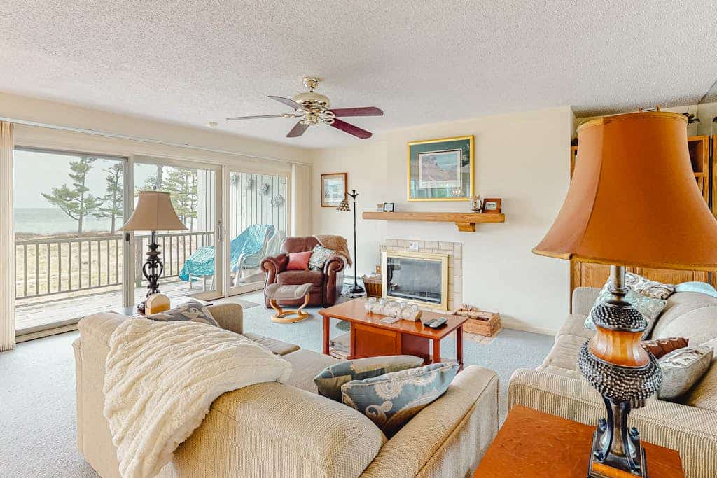 Lovely Lake Michigan beachfront condo with deck, washer/dryer, fireplace, views