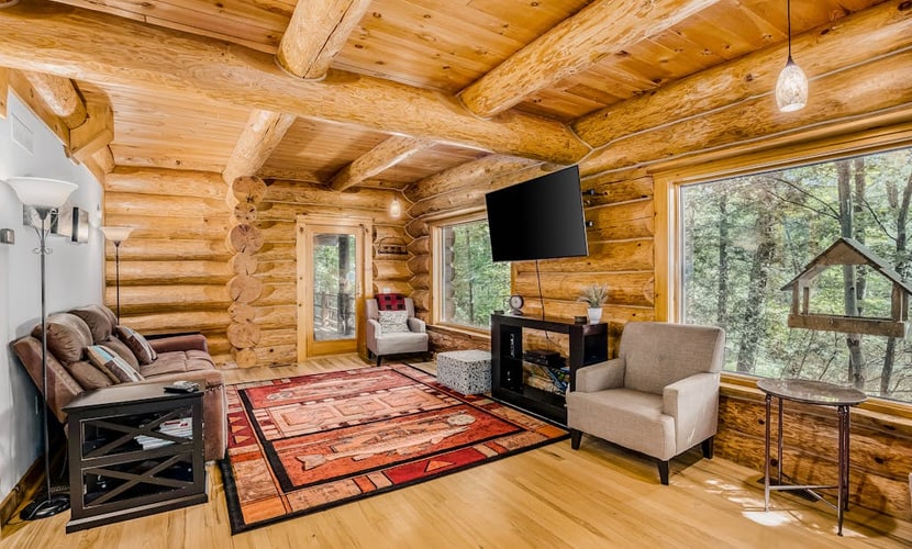 Waterfront home on Betsie River with hot tub & sauna near skiing at Crystal Mtn