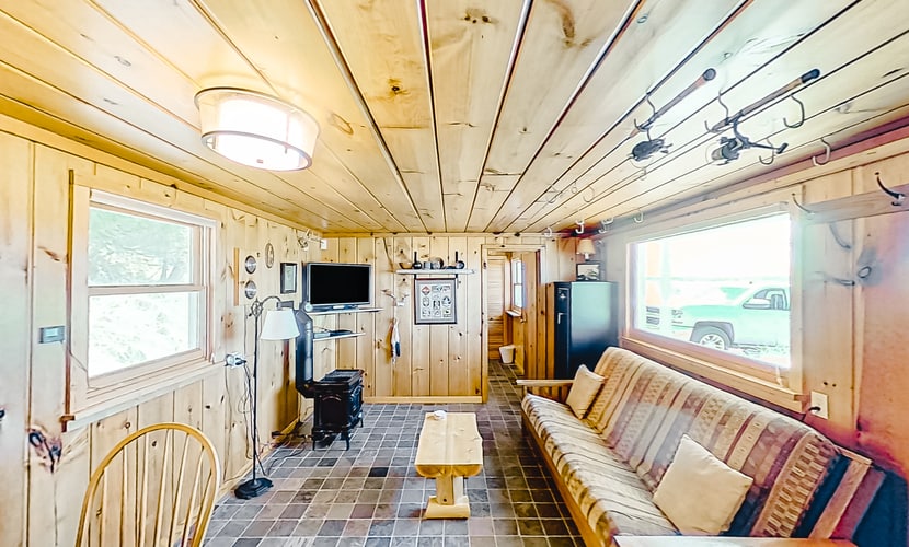 Rustic getaway on Crystal Lake w/ firepit, guest house & private dock