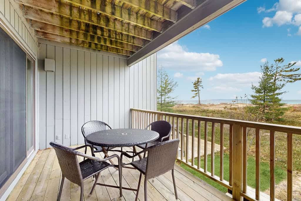 Beachfront condo on Lake Michigan with fireplace, deck, washer/dryer, great view