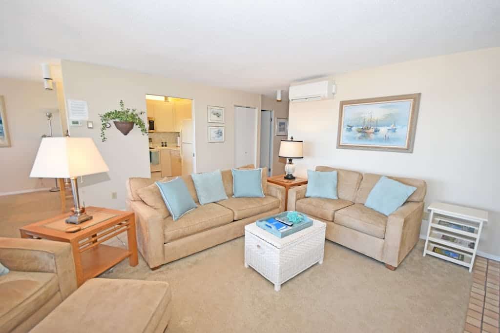 Beachfront condo with gorgeous Lake Michigan views, deck, fireplace, W/D, AC