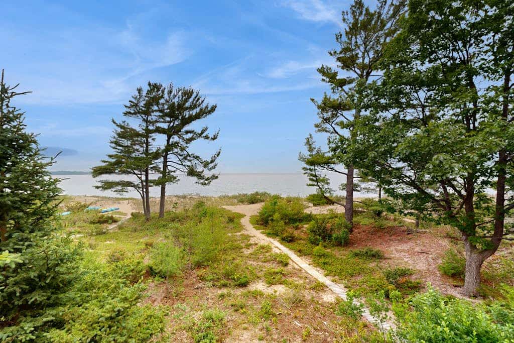 Lakefront condo with deck, gorgeous view, fireplace, & W/D