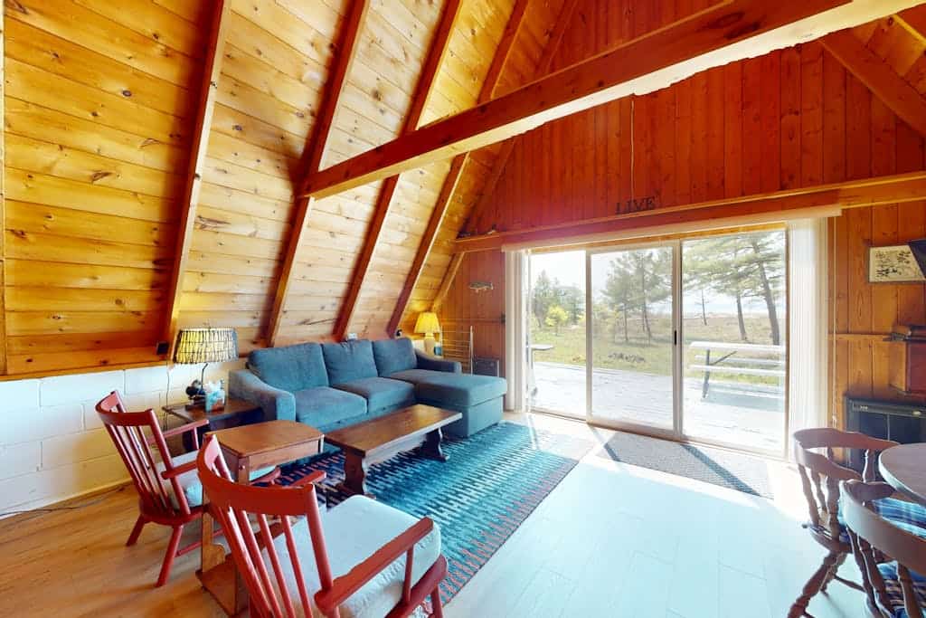 Rustic A-Frame Retreat on Grand Traverse Bay w/ beach, wifi, fire pit & grill