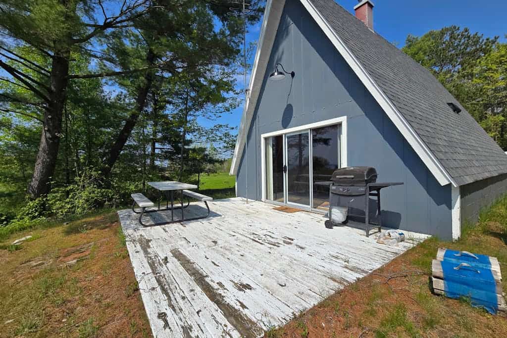 Rustic A-Frame Retreat on Grand Traverse Bay w/ beach, wifi, fire pit & grill