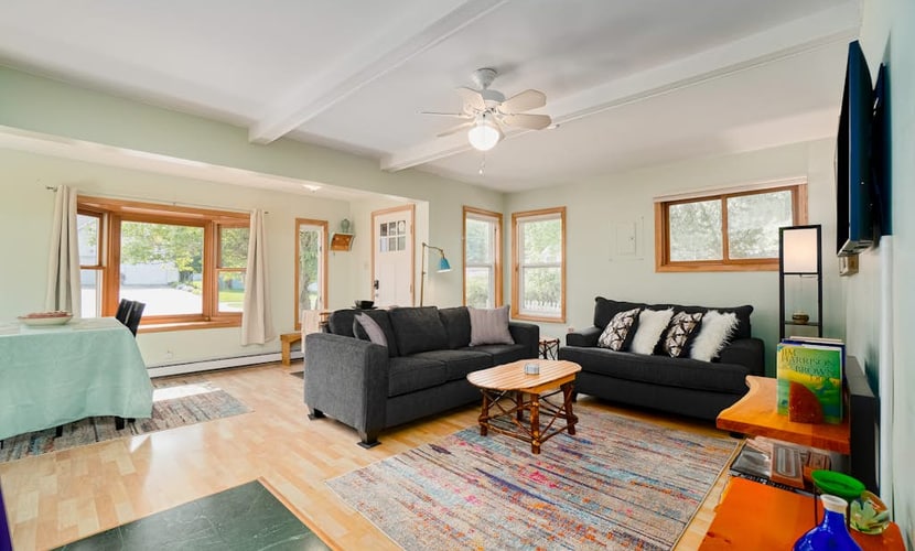 Dog-friendly cottage with fenced yard, firepit, W/D, & WiFi - walkable location