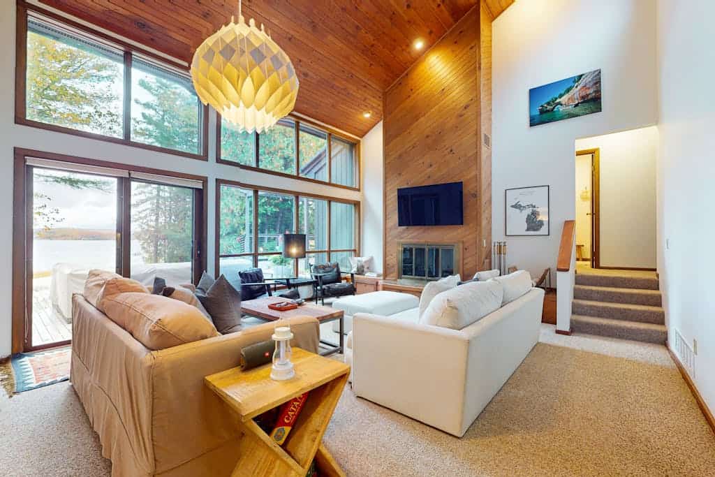Lakeside luxury Home‚Äîdock, firepit, and easy access to Michigan‚Äôs best towns!