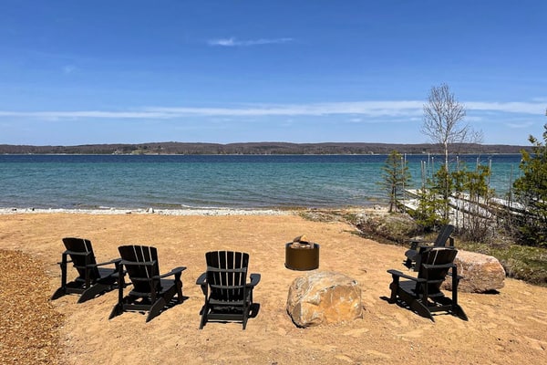Lakeside luxury Home—dock, firepit, and easy access to Michigan’s best towns!