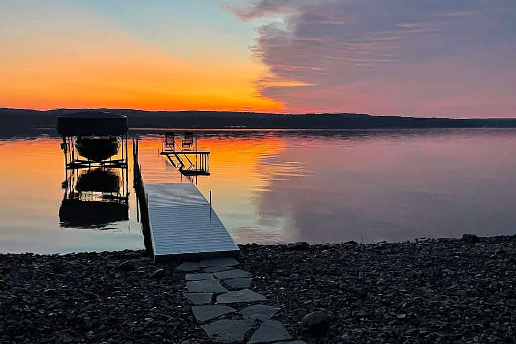 Lakeside luxury Home‚Äîdock, firepit, and easy access to Michigan‚Äôs best towns!